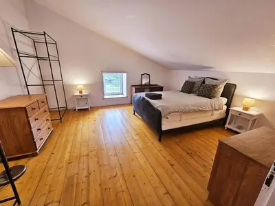 Un ou plusieurs lits dans un hébergement de l'établissement La spacieuse maison des miots