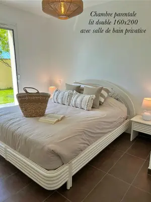 Un ou plusieurs lits dans un hébergement de l'établissement La Maison du Bonheur