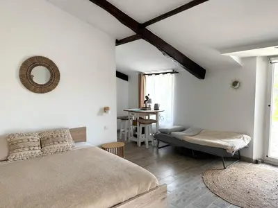 Un ou plusieurs lits dans un hébergement de l'établissement Chambres d'Hôtes ''SOUS L'OMBRE DES MIMOSAS''