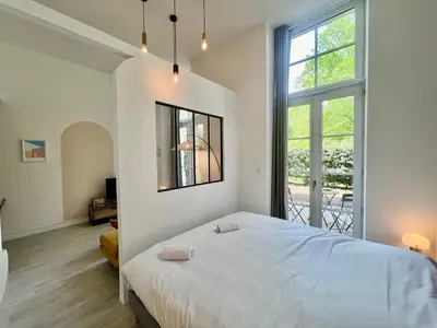 Un ou plusieurs lits dans un hébergement de l'établissement Le Clos Demoiselles