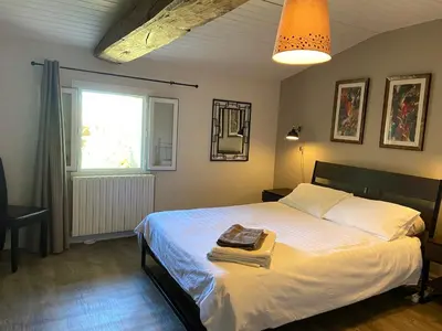 Un ou plusieurs lits dans un hébergement de l'établissement La Maison des Coteaux