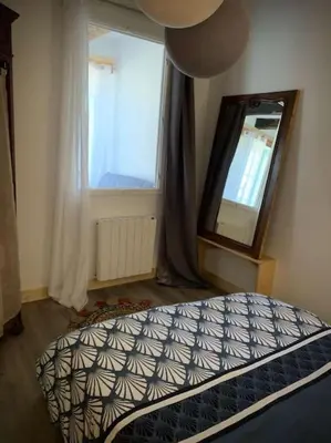 Un ou plusieurs lits dans un hébergement de l'établissement Appartement lumineux de 35m² en centre-ville