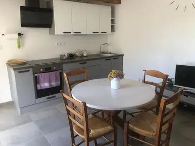Cuisine ou kitchenette dans l'établissement La Grange de la Brousse