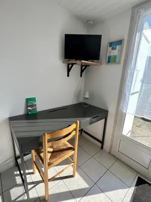 Télévision ou salle de divertissement dans l'établissement Chez Laurie et Xavier studio 3