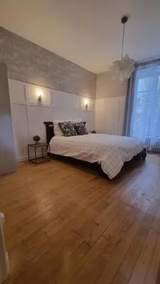 Un ou plusieurs lits dans un hébergement de l'établissement Appartement neuf avec garage + fibre
