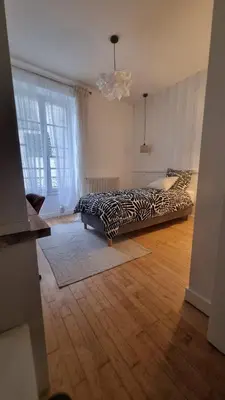 Un ou plusieurs lits dans un hébergement de l'établissement Appartement neuf avec garage + fibre
