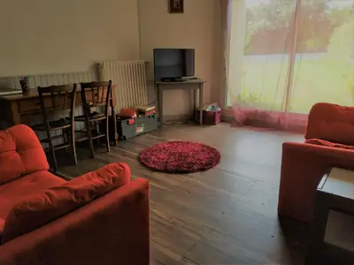 Coin salon dans l'établissement Gite du lavoir
