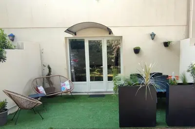 Jardin de l'établissement Appartement 4 personnes bord mer