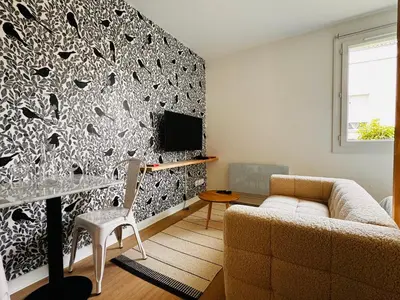 Télévision ou salle de divertissement dans l'établissement Appartement Bird II proche centre gare, parking