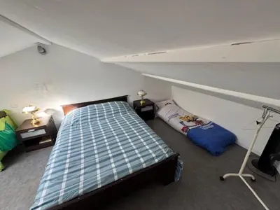 Un ou plusieurs lits dans un hébergement de l'établissement Chambre à la campagne