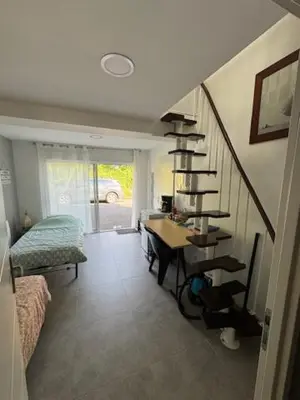 Un ou plusieurs lits dans un hébergement de l'établissement Chambre à la campagne