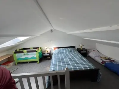 Un ou plusieurs lits dans un hébergement de l'établissement Chambre à la campagne