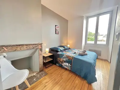 Coin salon dans l'établissement Le Cassiopée ~ T3 avec parking proche centre ville