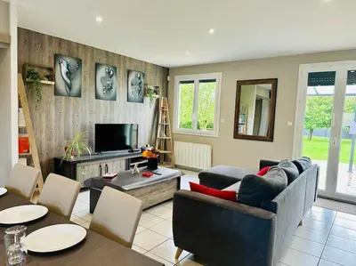 Coin salon dans l'établissement Au petit bonheur - Maison familiale au calme