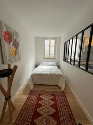 Un ou plusieurs lits dans un hébergement de l'établissement Appartement Hyper centre