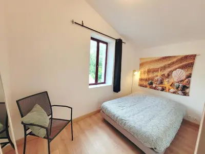Un ou plusieurs lits dans un hébergement de l'établissement Appartement 2 chambres centre-ville avec terrasse