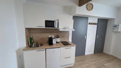 Cuisine ou kitchenette dans l'établissement BLD-Location