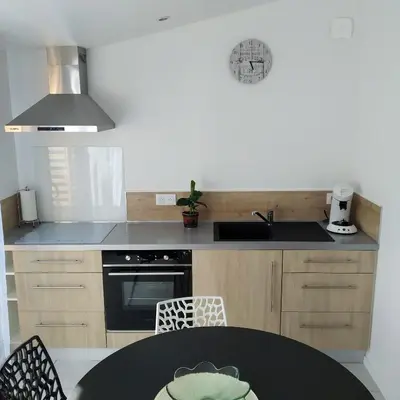 Cuisine ou kitchenette dans l'établissement Quatre As - Studio au calme