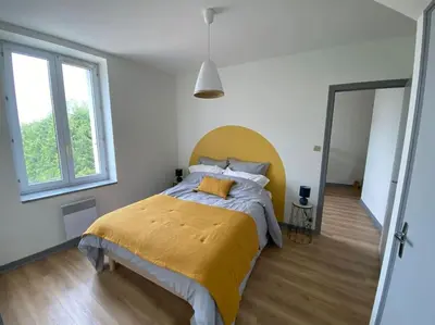 Un ou plusieurs lits dans un hébergement de l'établissement Appartement T4 et Parking à 3km du Futuroscope