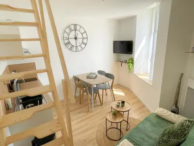 Télévision ou salle de divertissement dans l'établissement Appartement T2