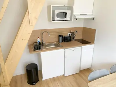 Cuisine ou kitchenette dans l'établissement Appartement T2