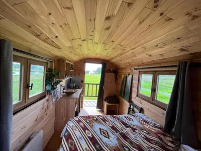 Un ou plusieurs lits dans un hébergement de l'établissement Les logements insolites de la Base Nautique