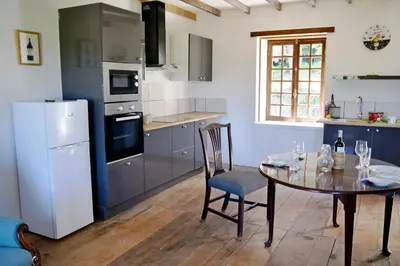 Cuisine ou kitchenette dans l'établissement Gite Du Jardin