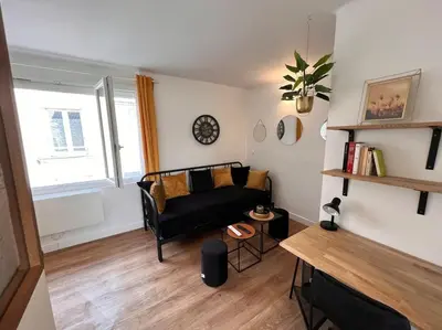 Coin salon dans l'établissement Cosy Appart - 4 personnes