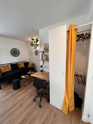 Coin salon dans l'établissement Cosy Appart - 4 personnes