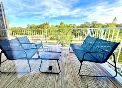 Balcon ou terrasse dans l'établissement Superbe appartement extérieur, 2 chambres, parking