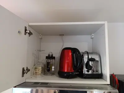 Cuisine ou kitchenette dans l'établissement Appartement meublé avec parking tv box netflix