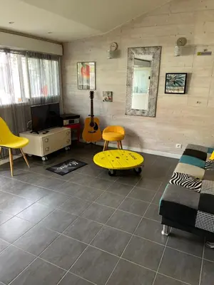 Coin salon dans l'établissement Maisonnette 40