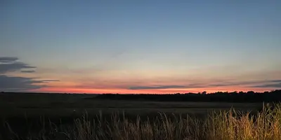 Lever ou coucher de soleil vu de la maison de vacances ou à proximité