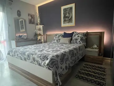 Un ou plusieurs lits dans un hébergement de l'établissement Charmante maison pour vos vacances