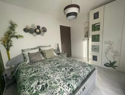 Un ou plusieurs lits dans un hébergement de l'établissement Charmante maison pour vos vacances