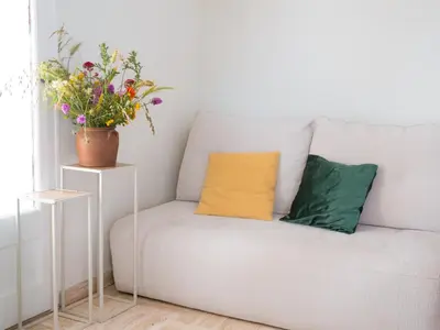 Coin salon dans l'établissement Gîte Demilenise - Villemain