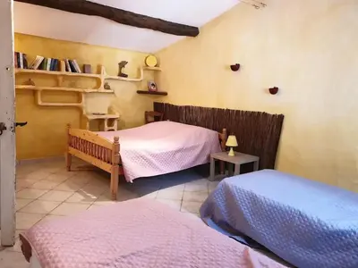 Un ou plusieurs lits dans un hébergement de l'établissement Maison accueillante avec piscine à Meursac + Spa