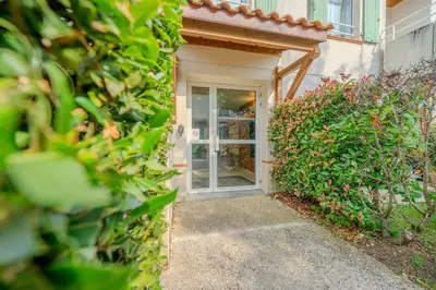 Jardin de l'établissement Appartement Cosy - Résidence avec Parc et Piscine