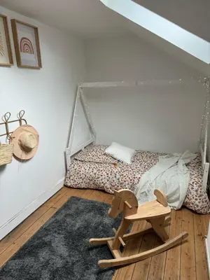 Un ou plusieurs lits dans un hébergement de l'établissement La maison du Maréchal