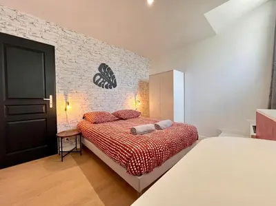 Un ou plusieurs lits dans un hébergement de l'établissement MAISON LA FEUILLERAIE N3-standingmaison-Wifi-proche centre ville-PROPERTY RENTAL NM