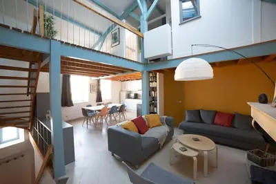 Coin salon dans l'établissement Maison type Loft - avec parking en plein centre