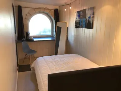 Un ou plusieurs lits dans un hébergement de l'établissement Maison type Loft - avec parking en plein centre