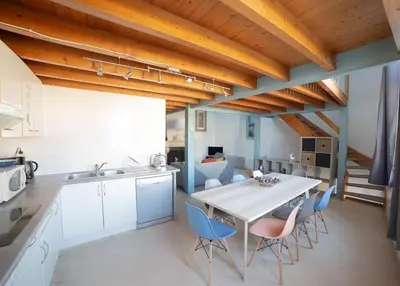 Cuisine ou kitchenette dans l'établissement Maison type Loft - avec parking en plein centre