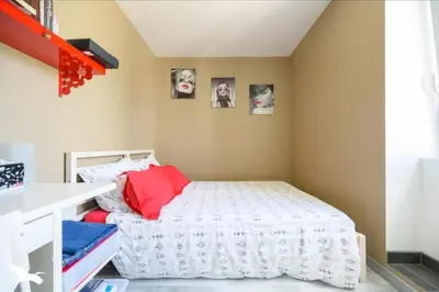 Un ou plusieurs lits dans un hébergement de l'établissement Belle maison proche plage