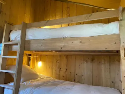 Un ou plusieurs lits dans un hébergement de l'établissement LODGE Champêtre Glamping