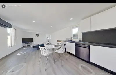 Cuisine ou kitchenette dans l'établissement Maison individuelle Aytré plage terrain clos 280m2 très calme