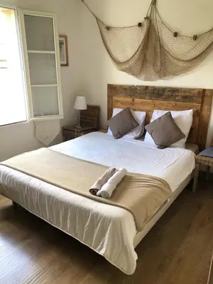 Un ou plusieurs lits dans un hébergement de l'établissement Villa Taru Marais Poitevin