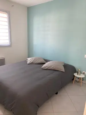 Un ou plusieurs lits dans un hébergement de l'établissement Maison à 10 minutes du Futuroscope