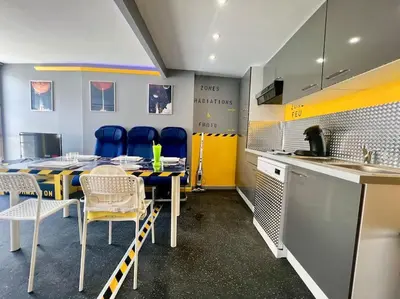 Cuisine ou kitchenette dans l'établissement Objectif Cosmos Magnifique T2 à 4 min du parc