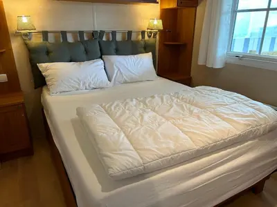 Un ou plusieurs lits dans un hébergement de l'établissement Mobil Home Bord de Mer